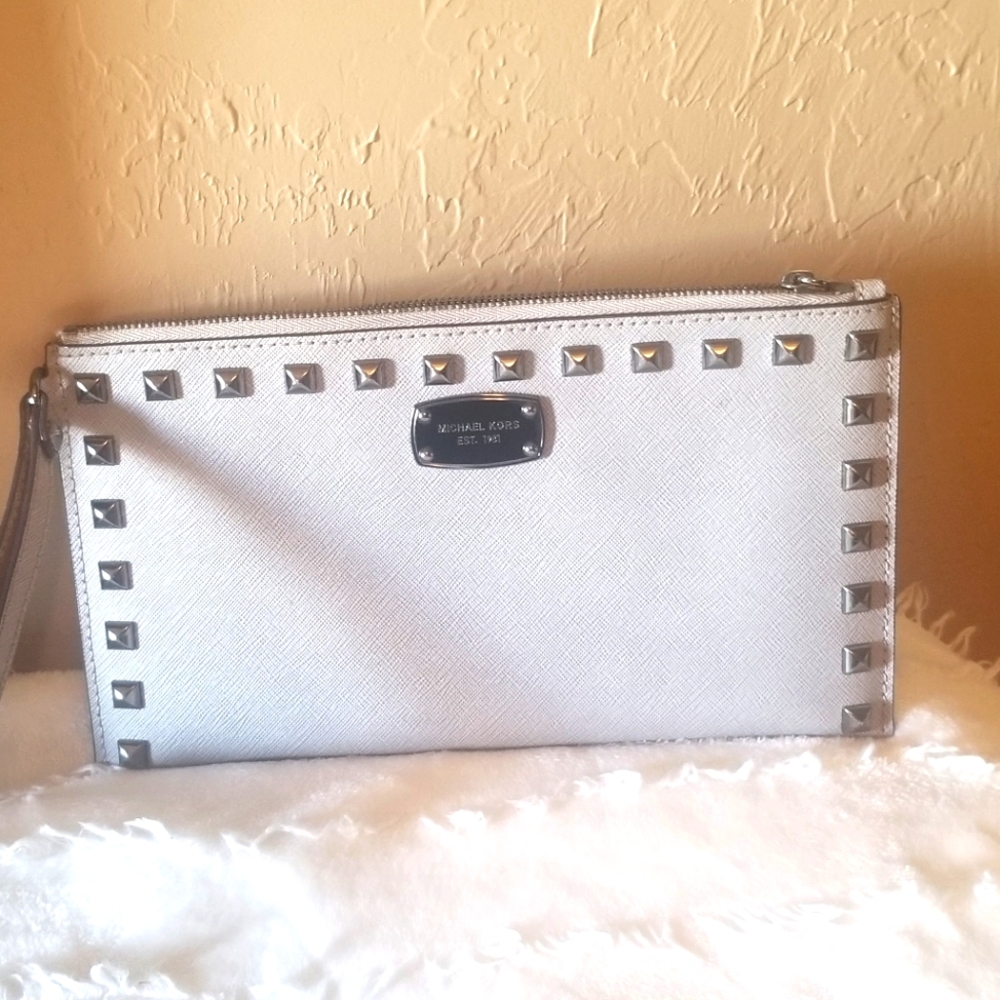 Michael Kors wristlet with gunmetal hardware